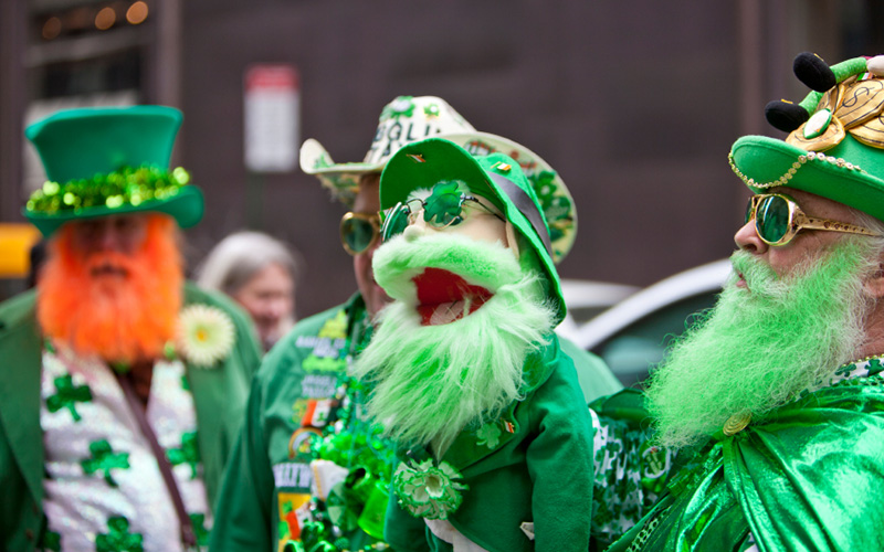 Photo of people dressed in green costumes celebrating St. Patrics Day in New York City