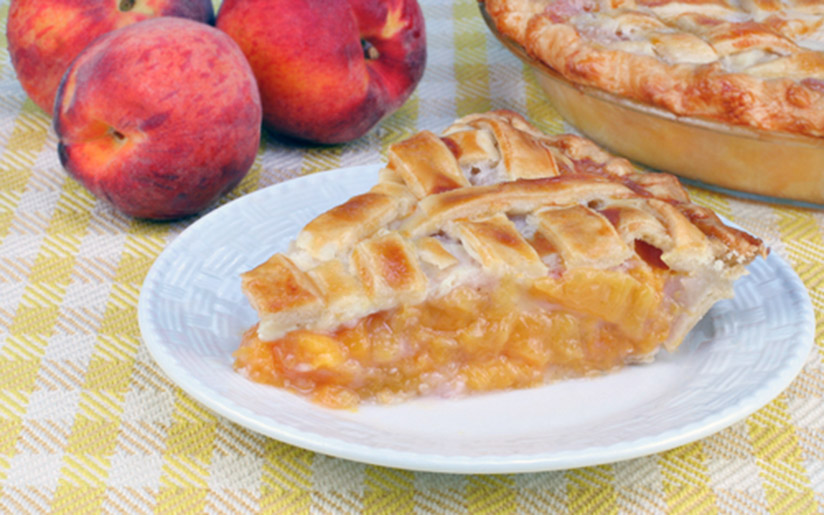 Photo of peaces and a slice of peach pie